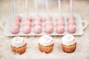 pink cake pops and cupcakes