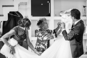 Family Checking wedding dress