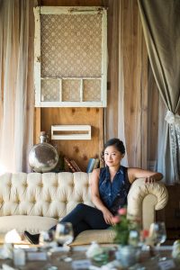 asian girl on the couch smiling