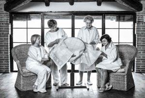 four ladies knitting table runner